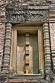 Angkor - Eastern Mebon - remarkable sculpted sandstone lintels of the temple towers